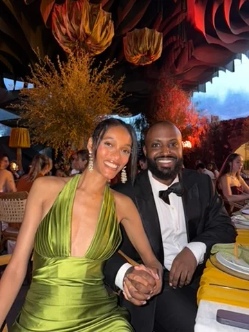 A couple dressed up for a celebration